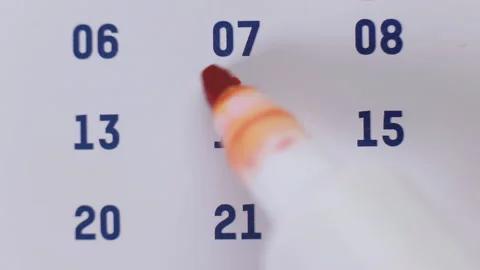 Red marker surrounding the date 14 on the calendar Stock Footage 155807718