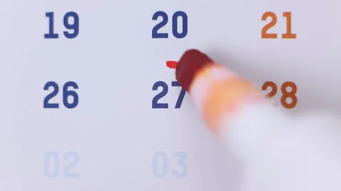 Red marker surrounding the date 27 on the calendar Stock Footage 155808527