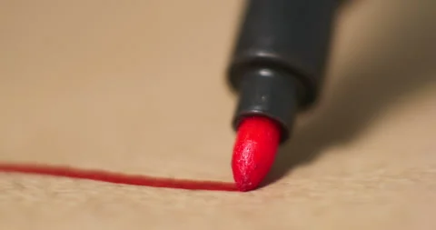 Red Marker Tip in Drawing Action Creating Lines on Paper Stock Footage 294262262