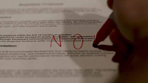 Red Marker Writes Red NO Over Business Proposal Paper Video stock 319509488