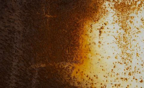 Red Martian rust: Close-up of a rusty metal surface. Textured background for  Stock Photos
