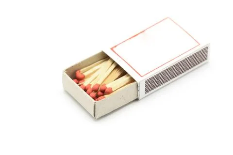 Red match in matchbox Stock Photos