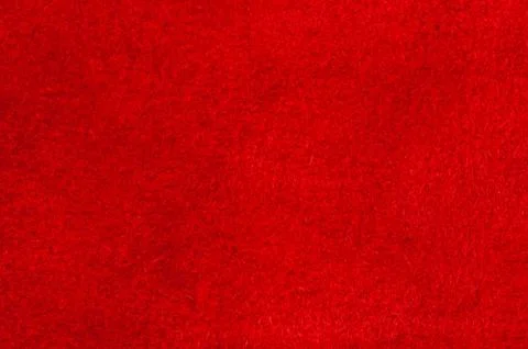 Red matte background of suede fabric. Velvet texture of seamless leather. Fel Stock Photos