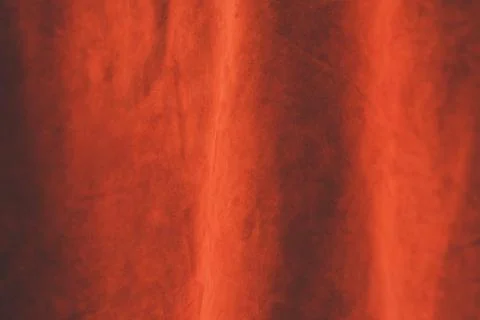 Red matte background of suede fabric. Velvet texture of seamless leather. Fel Stock Photos