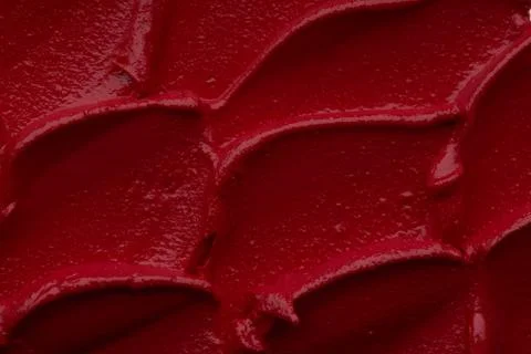 Red matte texture of lip gloss background Stock Photos