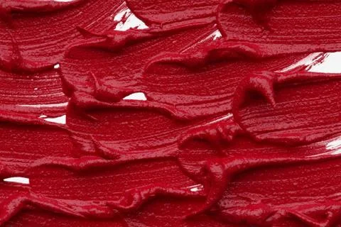 Red matte texture of lip gloss background Stock Photos