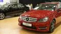 Red Mercedes-Benz C-class at automotive-show HD Footage