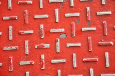 Red metal cover with pattern Stock Photos
