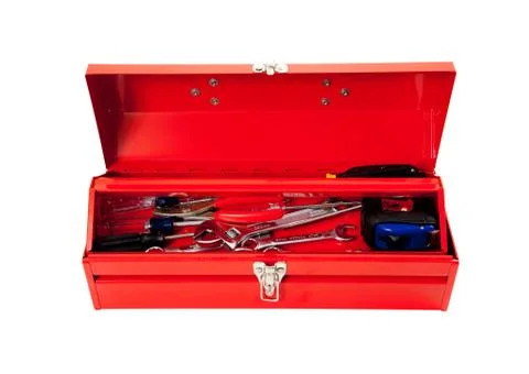 Red metal tool box with tools on white Stock Photos