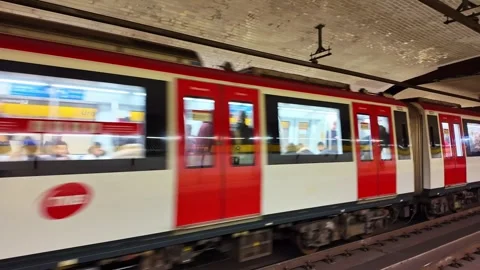 Red metro train arriving at station platform in Barcelona, Spain Stock Footage 336900171