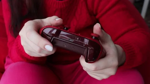 Red Microsoft Xbox One Gamepad. Stock Footage 229461899