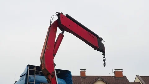 The red mobile car crane turn round Stock Footage 117428181
