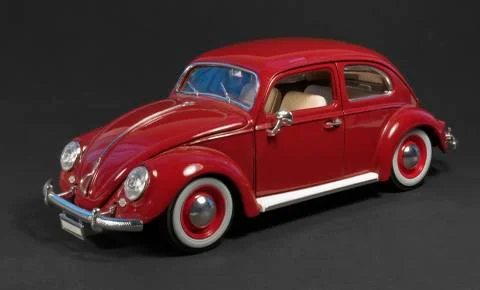 Red model car in dark back Stock Photos