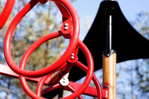 Red monkey bars at playground Stock Photos