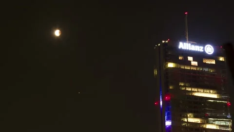 Red moon eclipse and Allianz Building Milan Italy Stock-Footage 151844472