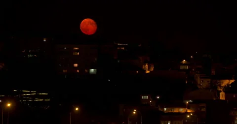 Red Moon in İstanbul Stock Footage 40762327