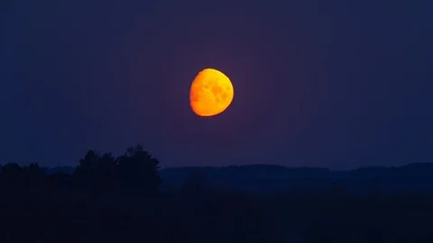 Red moon over horizon Stock Footage 111988178