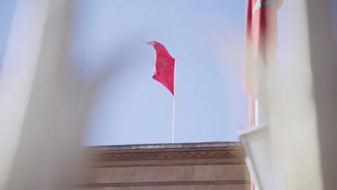 Red Moroccan Flag Blowing In Wind Video stock 146103163