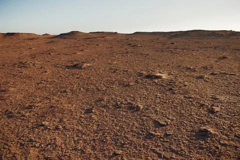 Red morrocan desert with blue empty sky Stock Photos