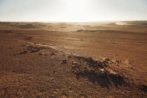 Red morrocan desert with blue empty sky Stock Photos