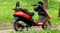 Red motor scooter HD Footage