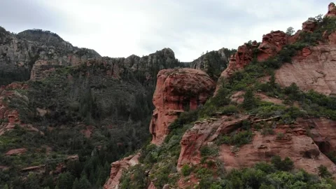 Red mountainside rock formations Stock Footage 141488100