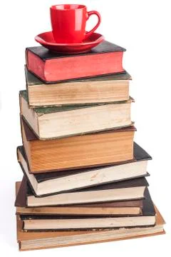 REd Mug on Books Stock Photos