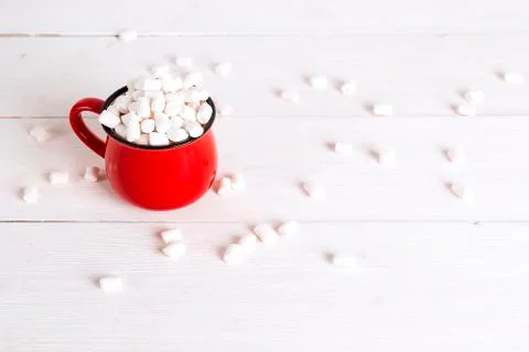 Red mug with marshmallows. Stock Photos