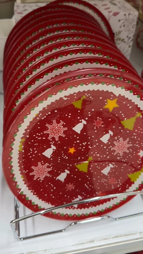 Red mugs with lattice pattern stacked on a shelf, suitable for holiday seas.. Stock Footage 320053272
