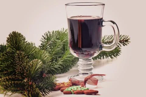 Red mulled wine and different decorations, retro toned Stock Photos