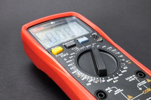 Red multimeter, multimeter or multitester, modern multifunctional voltage mea Stock Photos