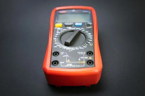 Red multimeter, multimeter or multitester, modern multifunctional voltage mea Stock Photos