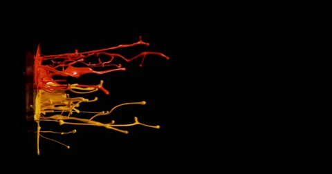 Red &amp; mustard paint in motion in 4K Stock Footage 59921365