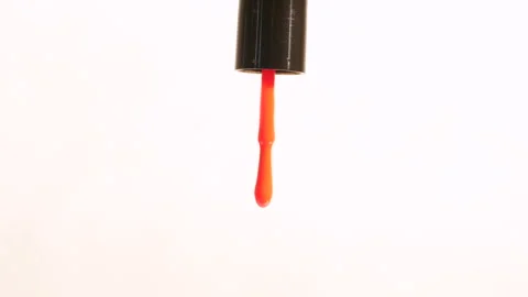 Red Nail Polish dripping on the floor Stock Footage 249997367