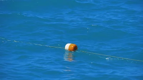 Red Navigation Buoy Floating on Sea.Sunny weather. Directional Sign for Marine Video stock 204948550
