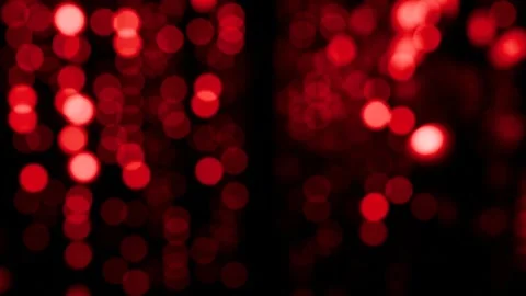Red neon bokeh background in a seamless loop. 스톡 동영상 291976689