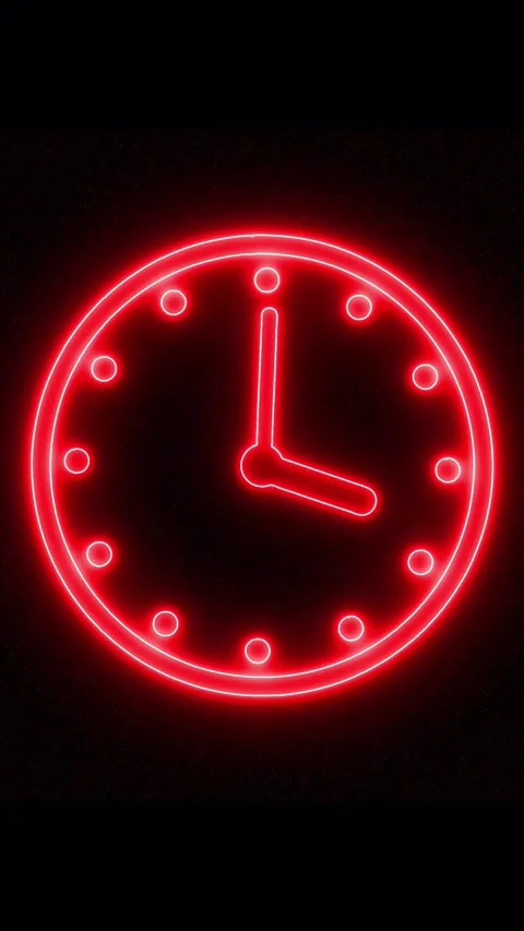 Red neon clock face with hour and minute hands on black. Red neon clock fac.. Stock Footage 344841830