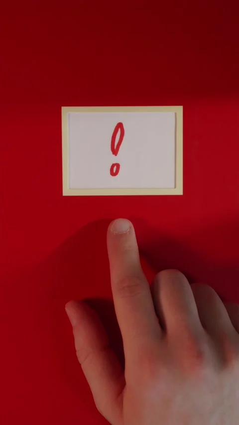 Red notebook with exclamation mark label flat lay Stock Footage 341246016
