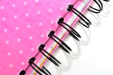 Red notebook with wire binding. 写真素材