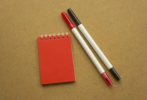 Red notepad for notes with red sheets. Blank space for notes. Mocap. Two felt Stock Photos