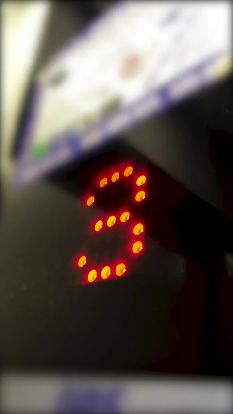 Red numbers 2, 3 on led screen. Elevator going from second to third floor Stock Footage 308922096