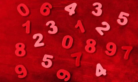 Red numbers background top view Stock Photos