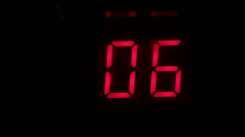 Red numbers on black Stock Footage 57861279