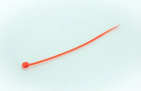 A Red Nylon Cable Ties on White Background Stock Photos
