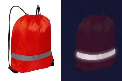 Red nylon drawstring bag with reflective tape Stock Photos