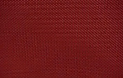 Red nylon fabric textured background with hexagonal shape Stock Photos