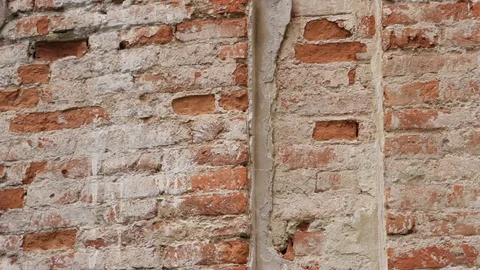 Red old brick torn wall window castle history architecture building city town Stock Footage 98154244