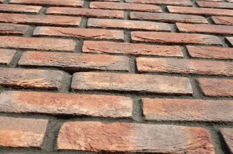 Red old brick wall background, brick wall texture, structure. old broken bric Stock Photos