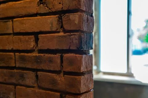 Red old brick wall texture, opened window on background Stock Photos
