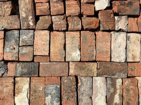 Red old bricks laid in one plane Stock Photos